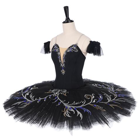 This professional Odile tutu has just been created according to the latest designs. The bodice, which fastens in the back with a double row of hooks and eyes, has been made with semi-stretchy black fabric and features a very rich decoration with silver appliques, pearls and blue crystals. The pancake, twelve layers tutu skirt is black and entirely embellished with the same kind of silver appliques and blue shiny decorations, as the bodice. Panties are ruffles and arm bands are included. Custom made. Measurements in centimeters to be sent to info@giselletutus.com after the purchase. Delivery time: 6 to 8 weeks Price: $ 630 + shipping Black Swan Tutu, Black Ballet Outfit, Ballora Cosplay, Pancake Tutu, Bubble Birthday, Ballerina Costume, Ballet Clothes, Ballet Tutu, Ballet Costumes