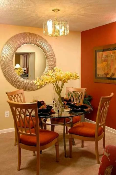 Orange Kitchen And Dining Room, Orange Floor Dining Room, Dinning Room Orange Decor, Rustic Orange Wall Paint, Burnt Orange Living Room, Living Room Color Combination, Dining Room Wall Color, Yellow Decor Living Room, Brown Dining Room