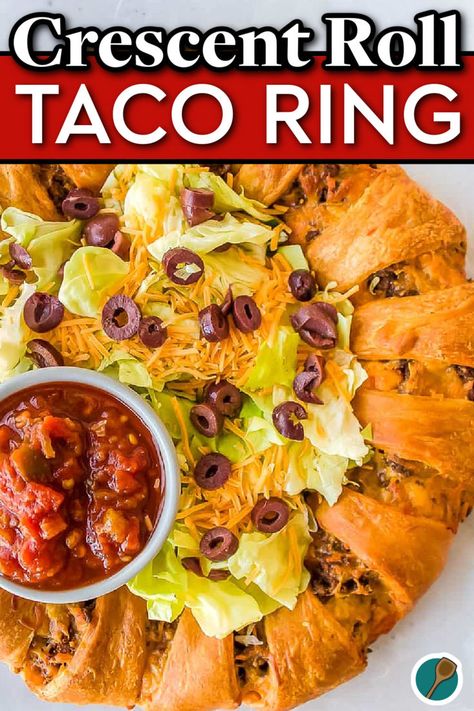 Close-up of a taco ring made with crescent rolls, topped with shredded lettuce, cheddar cheese, olives, and served with salsa. Taco Bake Casserole With Crescent Rolls, Crescent Roll Taco Ring, Crescent Roll Taco, Mexican Chicken Tacos, Crescent Ring Recipes, Ring Recipes, Taco Roll, Easy Crescent Rolls, Dip Appetizers