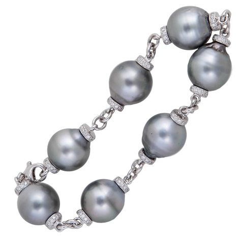 Baroque Tahitian and Diamond Gold Link Bracelet | From a unique collection of vintage modern bracelets at https://www.1stdibs.com/jewelry/bracelets/modern-bracelets/ Tahitian Jewelry, Minimalistic Jewellery, Black Pearl Jewelry, Movie Jewelry, Tahitian Pearls Jewelry, Baroque Jewelry, Bracelet With Pearls, Fine Pearl Jewelry, White Gold Bangle