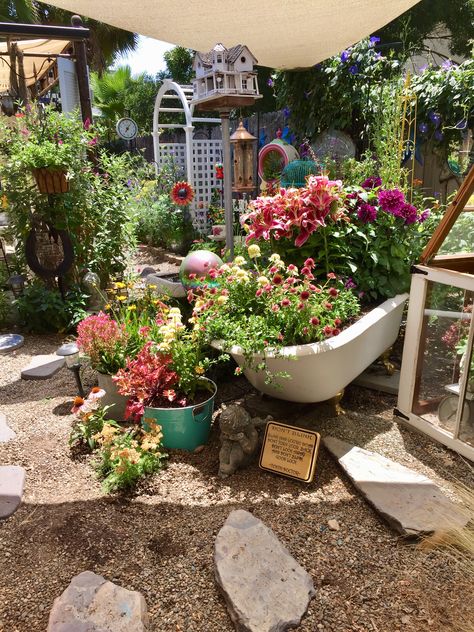 An old claw foot tub becomes a whimsical planter to my little garden Clawfoot Tub Garden Ideas, Clawfoot Tub Planter, Bathtub Planter Ideas, Tub Garden Ideas, Bathtub Pond, Bathtub Garden, Garden Bathtub, Garden Landscaping Ideas, Old Bathroom