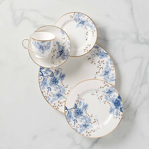 Inspired by toile artistry, the Lenox Garden Grove dinnerware collection features a monochromatic floral motif in rich shades of blue. Sparkling gold leaves and gold-accented rims are the perfect finishing touches to this delicate pattern. Garden Grove infuses traditional style and texture to create a memorable table. This collection is dishwasher safe, making it perfect for all occasions. White Dinnerware Set, Modern Floral Design, Toile Pattern, White Dining Room, White Dinnerware, Garden Grove, Blue Floral Pattern, Blue And White China, China Patterns