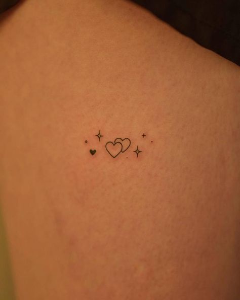 Interlocked Hearts Tattoo, Different Heart Tattoos, Small Heart On Hip Tattoo, Heart Constellation Tattoo, Small Heart Shoulder Tattoo, Small Mini Tattoos, Cute Tattoos Stars, Heart And Stars Tattoo, Heart With Stars Tattoo