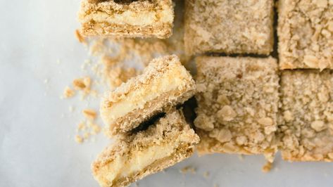 Lemon Oat Bars Recipe | Epicurious Snickerdoodle Cheesecake Bars, Snickerdoodle Cheesecake, Snicker Doodle, Picnic Desserts, Holiday Baking Recipes, Sugar Cookie Bars, Oreo Crust, Oat Bars, Bars Cookies