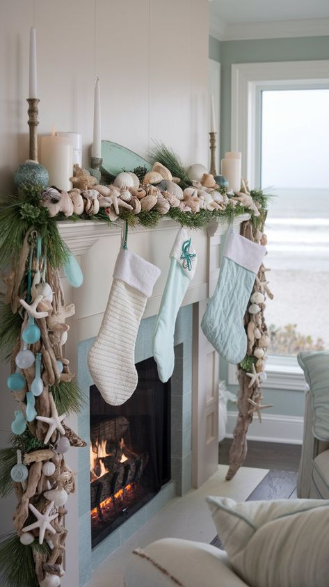 Cozy Up Your Home: 12 Magical Christmas Fireplace Decor Ideas for a Warm Holiday Vibe - AshiFinds Ocean Christmas Decor, Coastal Winter Decor, Coastal Christmas Mantle, Rose Gold Fairy Lights, Christmas Fireplace Decor Ideas, Cozy Christmas Fireplace, Coastal Winter, Rose Gold Candle Holder, Burgundy Decor