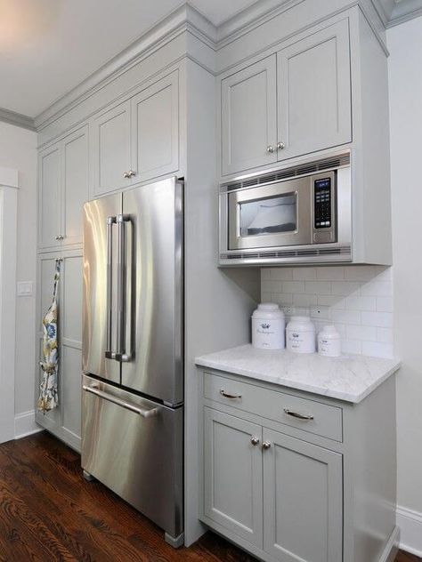 As you can see, it isn’t too hard to fit cabinets around the refrigerator in an efficient way! More decor and other interesting ideas at hackthehut.com Gray Shaker Kitchen Cabinets, Kitchen Cabinet Crown Molding, Серая Кухня, White Subway Tile Backsplash, Painted Kitchen Cabinets Colors, Kabinet Dapur, Shaker Kitchen Cabinets, Studio Kitchen, White Subway Tile