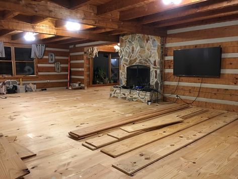 Log cabin home living room renovation with DIY wide plank pine floors. Log Cabin Flooring Ideas, Glass Treehouse, Plank Flooring Diy, Log Cabin Flooring, Log Home Flooring, Best Wood Flooring, Faux Wood Flooring, Wide Plank Floors, Wide Plank Hardwood Floors