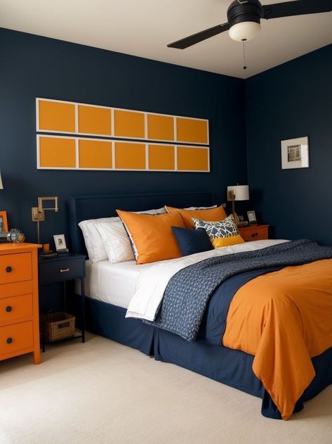 Create a bold and stylish bedroom for boys by painting one wall in a deep navy color. Complement the accent wall with a modern industrial-inspired bed frame and add pops of orange or yellow through throw pillows and decor for a vibrant touch. Dim Bedroom, Boys Bedroom Orange, Orange Boys Rooms, Navy Accent Wall, Bedroom For Boys, Orange Bedroom Decor, Navy Accent Walls, Orange Paint Colors, Navy And Orange