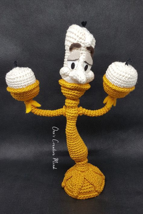 Check out my Lumiere crochet pattern with step-by-step instructions. Perfect for those of you that love Disney inspired amigurumi. The FREE video tutorial is available on my YouTube channel. The written pattern is Patreon only content so you will have to sign up to my Patreon to access it. With a midi tier subscription of £5 per month (that you can cancel at anytime) you will gain access to ALL of my Patreon patterns. Disney Character Crochet Patterns, Crochet Pixar Characters, Beauty And The Beast Crochet Pattern, Disney Characters Crochet, Disney Crochet Projects, Disney Crochet Ideas, Crochet Disney Patterns, Free Disney Crochet Patterns, Crochet Beauty And The Beast