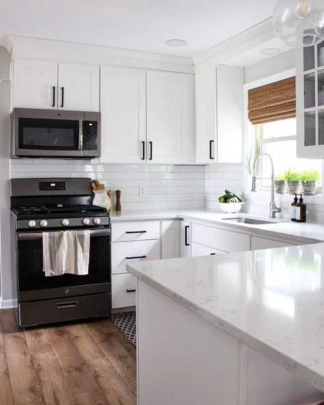 Small Kitchen Remodel White Appliances, White Kitchen Cabinets And Countertops, Black Knobs On White Cabinets, Light Grey Subway Tile Backsplash, White Shaker Kitchen Cabinets Modern, White Kitchen With Black Handles, Grey Stone Countertops, White U Shaped Kitchen, White Kitchen Black Handles