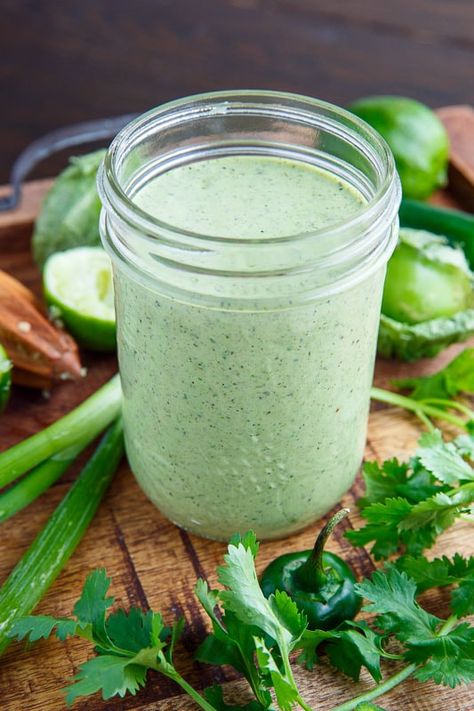 Creamy Tomatillo Ranch Dressing Cilantro Lime Ranch Dressing, October Meals, Cilantro Lime Dressing Recipe, Cilantro Ranch Dressing, Cilantro Garlic Sauce, Keto Salad Dressing, Cilantro Lime Sauce, Cilantro Dressing, Ranch Dressing Recipe