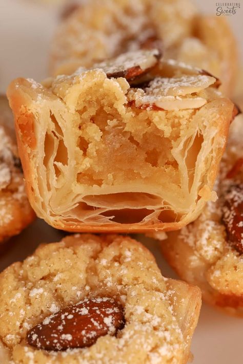 Almond croissant bite cut in half topped with sliced almonds. Almond Croissant Cookies, Almond Crescent Cookies, Crescent Cookies, Almond Joy Cookies, Cranberry Cake, Almond Croissant, Holiday Favorite Recipes, Keto Friendly Desserts, Mini Muffin Pan