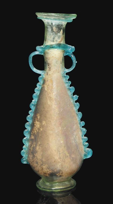 A LATE ROMAN OR BYZANTINE PALE GREEN GLASS AMPHORA Ancient Vessels, Roman Artifacts, Eastern Mediterranean, Antique Glass Bottles, Glass Rocks, Ancient Roman Glass, Ancient Pottery, Art Premier, Roman Glass