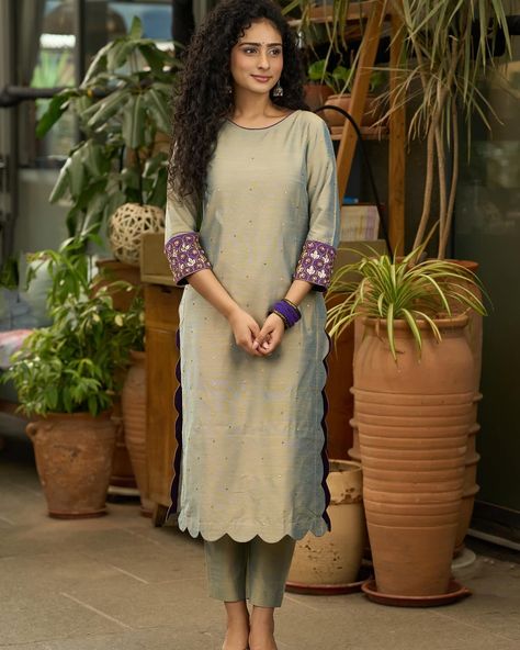 Discover the perfect blend of style and comfort with our Exclusive dull green & purple Cotton silk Co ord set with embroidery. Made with high-quality materials, this set offers a luxurious feel while the intricate embroidery adds a touch of elegance. Elevate your wardrobe and make a statement with this exclusive set. #sujatra #sujatraglobal #cottonsilk #coordset #cottoncoordsets #festivewear #stylencomfort #embroidery Silk Co Ord Set, Co Ords Outfits Indian, Cotton Dress Pattern, Straight Cut Dress, Silk Kurti Designs, Stylish Kurtis Design, Churidar Designs, Silk Kurti, Latest Dress Design