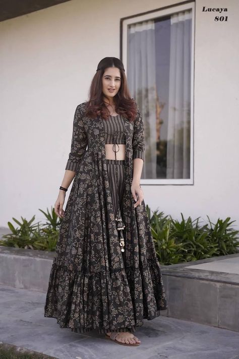 Stunning 3-piece Koti Style Indo-Western Suit of Printed Crop Top, Palazzo And Parallels paired With a Beautiful Printed Shrug Set Fabrics:- Heavy MUSLIN Silk With Digital Printed Work Crop Top Inner Attached Size :- XS-34, S-36, M-38, L-40, XL-42, XXL-44, 3XL-46, 4XL-48, 5XL-50 & 6XL-52 Length :- Shrug - Max Up to 55-57" Crop Top - Max Up to 15" Palazzo - Max Up to 38-40" Flair :- Shrug - Approx 3.00 to 4.40 Mtr. Fancy Crop Top, Western Suit, Trendy Outfits Indian, Printed Crop Top, Long Gown Design, Lehenga Designs Simple, Traditional Outfit, Trendy Dress Outfits, Designer Dresses Casual