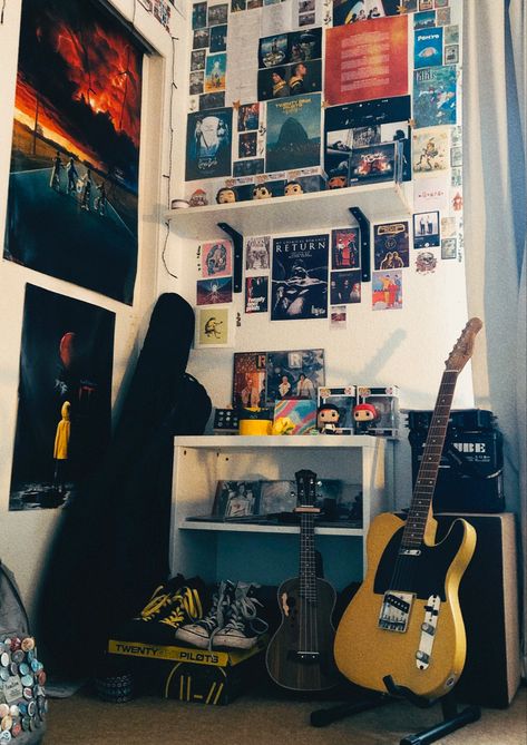 Room with many music and movie posters plus a guitar and ukulele Room Ideas Emo Aesthetic, Room Emo Aesthetic, My Chemical Romance Room Ideas, Emo Grunge Room Aesthetic, My Chemical Romance Bedroom, Emo Aesthetic Room, Emo Room Inspo 2000s, Paramore Aesthetic, Emo Aesthetic