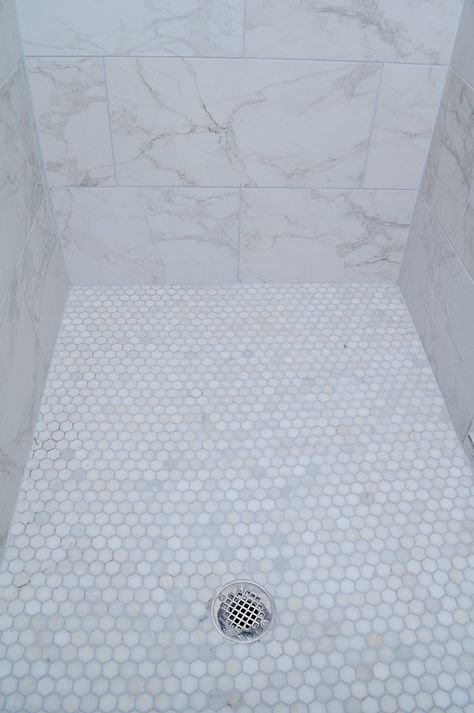 Lowes Statuary White Porcelain Tile, Groutless Tile Shower Ideas, Marble Look Master Bath, Coastal Bathroom Tiles Ideas, 12x24 Carrara Shower Wall Tile, 12x24 Marble Shower Wall Tile, Shower With Hexagon Tile Floor, 12*24 Bathroom Tiles, Matching Tile Shower And Floor