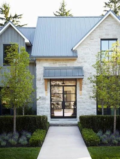 24 Board and Batten Siding Ideas | Sebring Design Build Stone And Board And Batten Exterior, White Board And Batten Exterior, White Board And Batten Siding, Train House, Board And Batten Exterior, Siding Ideas, Farmhouse Exterior Design, Modern Farmhouse Home, Exterior Makeover