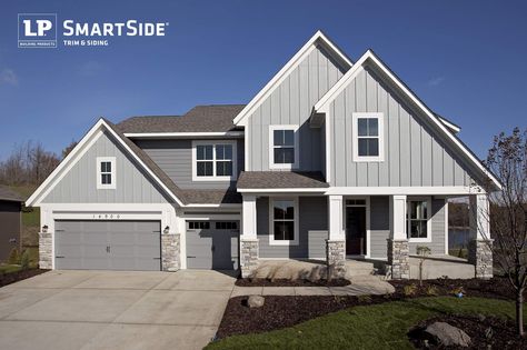 LP SmartSide lap siding, panel siding and trim on a house built by Robert Thomas Homes. Exterior Rock Siding, Exterior Design Traditional, Vinyl Siding Styles, Stone Panels Exterior, Lp Smartside Siding, Smartside Siding, Clopay Garage Doors, Lp Smart Siding, Stone Siding Exterior