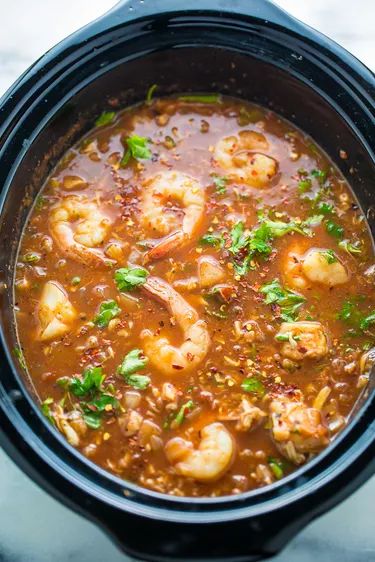 Slow Cooker Seafood Cioppino Recipe | eHow Crab Cioppino, Slow Cooker Seafood, Seafood Cioppino, Cioppino Recipe, Seafood Stew Recipes, Seafood Soup Recipes, Seafood Stew, Seafood Soup, Easy Slow Cooker Recipes