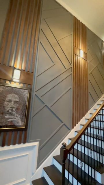 Decorative Stair Wall Ideas, Stairs Wall Panelling Design, Stairwell Wall Design, Accent Wall Going Down Stairs, Wood Panelling Staircase, Tall Wall Paneling Ideas, Black Accent Stair Wall, Staircase Wall Panelling Ideas, Stair Panelling With Handrail