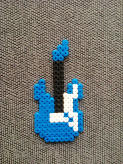 Electric guitar Guitarra eléctrica Hama beads #electricguitar #guitarra #hama Hama Bead Album Covers, Guitar Hama Beads, Electric Guitar Perler Beads, Electric Guitar Pixel Art, Perler Bead Guitar, Guitar Perler Beads, Iron Beads Ideas, Ironing Beads Ideas, Ironing Beads