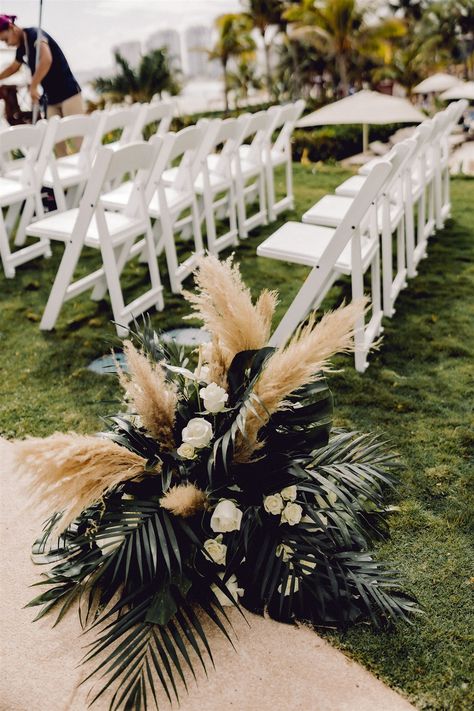 tropical floor arrangment for wedding aisle. Tropical leaves, white roses and pampas with white chairs Floor Florals Wedding Ceremony, White Roses And Pampas, Boho Glam Wedding, Floral House, Green Wedding Flowers, White Chairs, Dream Wedding Decorations, Baby Foods, Wedding Decor Inspiration