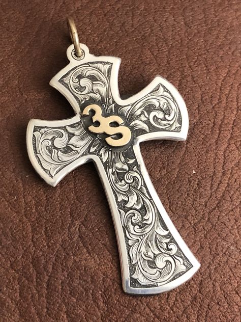 18 gauge sterling silver cross, hand engraved with a brass brand overlay. Hand Engraved Jewelry, Engraved Cross, Bamboo Fly Rod, Sterling Silver Cross Pendant, Engraving Art, Metal Engraving, Sterling Jewelry, Sterling Silver Cross, Engraved Jewelry