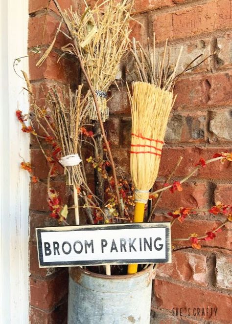 Halloween Home Tour - broom parking with diy twig brooms  |  She's Crafty Witches Broom Porch Decor, Halloween Broom Parking, Hanging Brooms Halloween, Broom Decorations Ideas, Broom Parking Sign Diy, Halloween And Fall Decorations Together, Aesthetic Halloween Nails, Broom Parking Sign, Country Halloween Decor