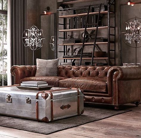 This Chesterfield Sofa would look phenomenal in any of our Storybook or Urban English Cottage homes. | Check out Elements House Plans Collection. | Chesterfield Sofa | Chesterfield Couch | Chesterfield Sofas | Living Room Decor | Sofa Inspiration | Coffee Table | Coffee Tables | Coffee Table Ideas | Living Room Goals | Restoration Hardware | Custom Home Builder | Custom Home Builders | Floor Plans Designer | House Plans Designer | Home Plans Designer | Lighting | Shelving | Design Inspiration Rustic Glam Living Room, Rustic Industrial Living Room, Chesterfield Sofa Living Room, Industrial Living Room Design, Masculine Living Rooms, Industrial Home Design, Sofa Inspiration, Glam Living Room, Industrial Livingroom