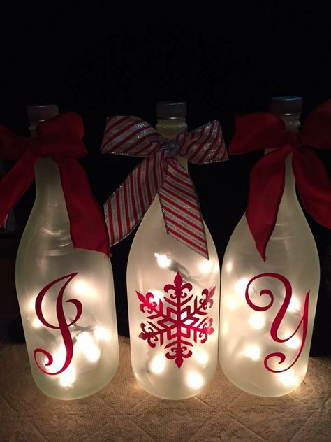 Light Up Wine Bottles Christmas, Decorated Glass Bottles, Lighted Wine Bottles Christmas, Lighted Wine Bottles Ideas, Diy Wine Bottle Crafts With Lights, Frosted Wine Bottles Diy Craft Ideas, Christmas Bottle Ideas, Frosted Wine Bottles, Wine Bottles Ideas