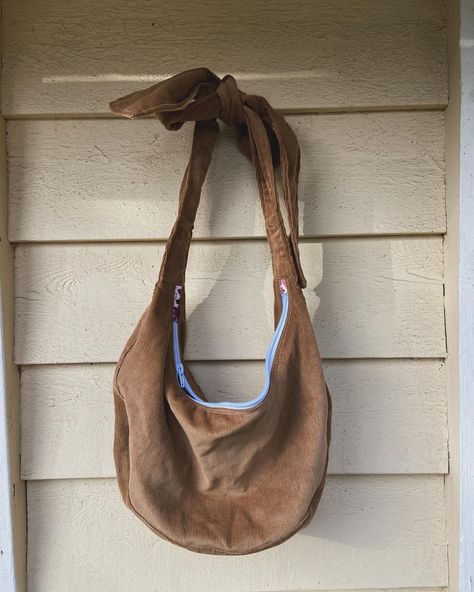 SOLD Caramel tie bag 🍮 Classic crescent with slouchy micro wale corduroy and bow tie strap ✨ #crescentbag #crosstowncrescentbag #bowbag #handmade #upcycled Bow Bag, Bow Tie, Crescent, Wales, Caramel, On Instagram, Instagram