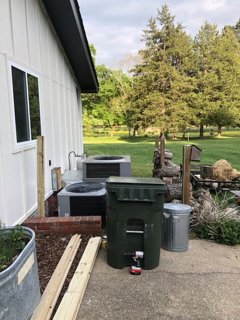 Easy DIY AC Unit Cover with Garbage Can Storage Hiding Garbage Totes Outside, Conceal Ac Unit, Hide Generator Outside, How To Hide Propane Tank In Yard, Hiding Ac Unit Outside, How To Hide Ac Unit Outside, Hide Garbage Cans Outside, Outdoor Trash Can Hideaway, Hide Ac Unit Outside