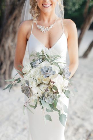 I wanted a very natural-looking bouquet – all white florals with lots of greenery throughout for our Key Largo wedding. I included seeded eucalyptus and succulents., along with white hydrangeas and roses. Modern Wedding Bouquets, Hydrangea Bouquet Wedding, Succulent Bouquet Wedding, Cascading Wedding Bouquets, Winter Wedding Bouquet, Summer Wedding Bouquets, White Hydrangeas, Succulent Bouquet, Winter Wedding Colors