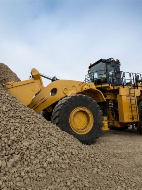 Since 1968, the 992 has been setting the bar for large wheel loader performance. Learn more about this machine's history — and what comes next. For new, used, or rebuilt heavy equipment parts call ConEquip Parts! (716) 235-1753 or visit our website www.conequip.com #Caterpillar #ICON #CAT992 #992 #emissions #RaisingTheBar #WheelLoader #ConEquip #WheelLoaderparts #CATWheelLoader #heavyequipment #construction Mining Equipment, Wheel Loader, Building Techniques, Construction Equipment, Heavy Equipment, The Bar, Caterpillar, The History, Around The Worlds