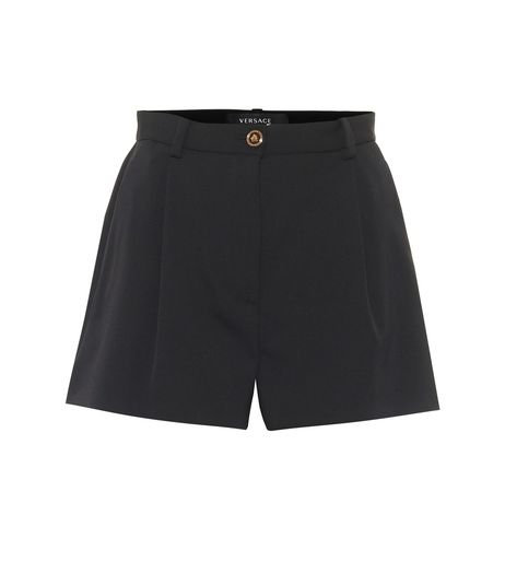 Versace - High-rise stretch-wool shorts - Emulate Versace’s sophisticated Spring ’20 aesthetic with these black shorts, which echo a string of styles featured on the runway. Made in Italy from stretch-wool twill, they’re tailored to a straight-leg silhouette with a high-rise waistline that secures with a logo-embossed button. Showcase yours with a tucked-in shirt or tank top. seen @ www.mytheresa.com Manchester House, Wool Shorts, 20 Aesthetic, Capsule Wardrobe Pieces, Versace Shorts, Closet Aesthetic, Black Leather Shorts, Studio 54, Versace Outfit