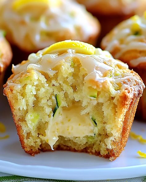 Make delicious Lemon Zucchini Cream Cheese Muffins with a creamy center and tangy lemon glaze. Moist, flavorful, and perfect for all occasions. Lemon Cream Cheese Muffins, Lemon Zucchini Muffins, Muffin Ideas, Zucchini Muffin Recipes, Refreshing Breakfast, Lemon Zucchini, Simple Muffin Recipe, Cream Cheese Muffins, Lemon Muffins