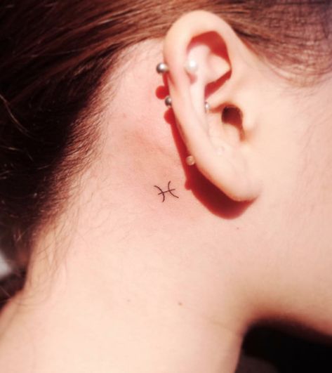 pisces behind ear tattoo - Google Search Pisces Tiny Tattoo, Pisces Tattoo Behind The Ear, Pisces Tattoo Behind Ear, Tiny Zodiac Tattoos, Tiny Behind The Ear Tattoos, Pices Zodiac Tattoo, Pisces Symbol, Pisces Tattoo Designs, Cosmic Tattoo