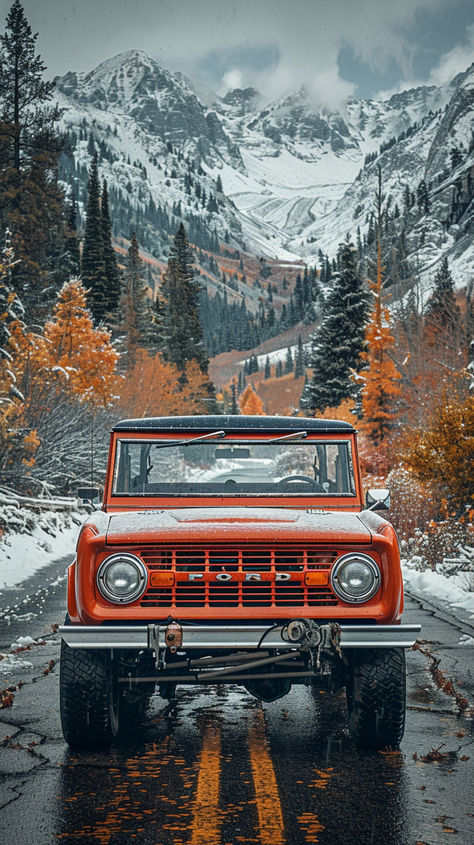 A vintage U15 Ford Bronco driving down a snow-dusted mountain road, surrounded by autumnal trees and towering snowy peaks. Old Ford Bronco, Offroad Cars, Old Bronco, Mini Trucks 4x4, Bronco Ford, 1979 Ford Truck, Classic Bronco, Early Bronco, Classic Ford Broncos