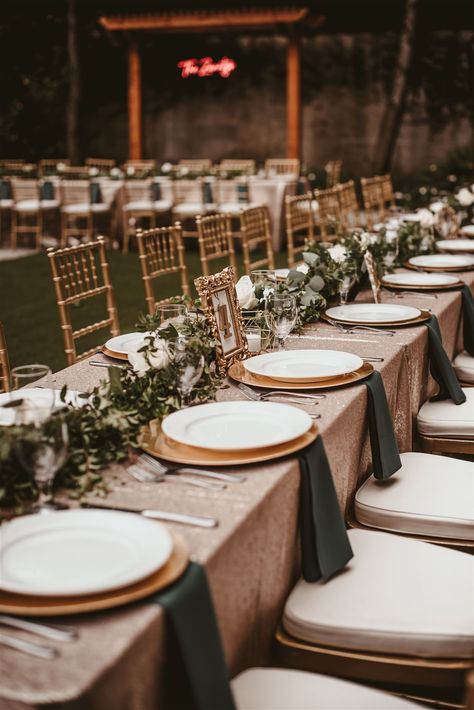 gold and green, wedding decor, long tables, wedding, neon sign, Napa photographer Gold Dark Green Wedding, Champagne And Deep Green Wedding Theme, Green And Gold Wedding Aesthetic, Dark Green Gold White Wedding, Green And Gold Outdoor Wedding, Gold And Green Table Setting Wedding, Emerald Green And Gold Outdoor Wedding, Fall Wedding Table Cloth Ideas, Green Gold Brown Wedding Colors