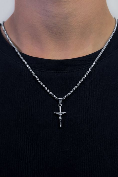 Showcase your faith in style with our exquisite Men's Cross Pendant. This Jesus Cross Necklace, finely made with Stainless Steel, is designed to be a fashionable representation of your Christian beliefs. The silver tone of this necklace adds an element of elegance, making it perfect to wear for church gatherings or social events.  #jesuscross #menstyle #stainlesssteel #faithjewelry #churchaccessories #silvertone #statementoffaith #believer #churchman #etsyde Christian Accessories, Faith Jewelry, Christian Men, Cross Chain, Mens Crosses, Jesus On The Cross, Box Chain, Stainless Steel Chain, Men Necklace