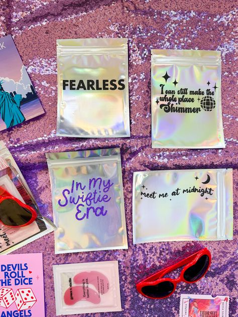 fearless, I can still make the whole place shimmer, Meet me at midnight, In My Swift Era, under eye mask Taylor Swift Piñata Ideas, Party Favors Aesthetic, Taylor Swift Birthday Goodie Bag, Taylor Swift Party Bags, Eras Tour Sleepover, Taylor Swift 40th Birthday Party, Taylor Swift Movie Night, Taylor Swift Sleepover Party, Taylor Swift Girls Birthday Party