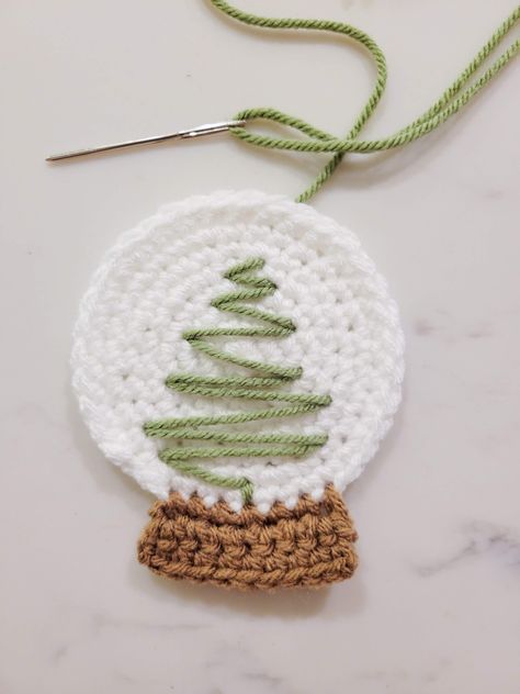 Crochet Christmas Tree Snow Globe | Heather Corinne Crochet Snowglobe Ornament, Crochet Christmas Snow Globes, Crochet Snow Globe Ornament, Snow Globe Crochet, Free Crochet Holiday Patterns, Free Crochet Christmas Tree Ornaments, Crochet Christmas Tree Decorations Free, Easy Christmas Crochet Ornaments, Crochet Christmas Coaster Pattern