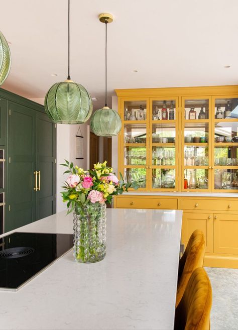 Probably the most striking and eye grabbing part of the kitchen (and designer David’s pride and joy) is the dresser display unit. Painted in a beautiful mustard yellow, this unit features two shallow drawers with cupboards below as well as two double glass fronted cabinet doors and a mirrored back.