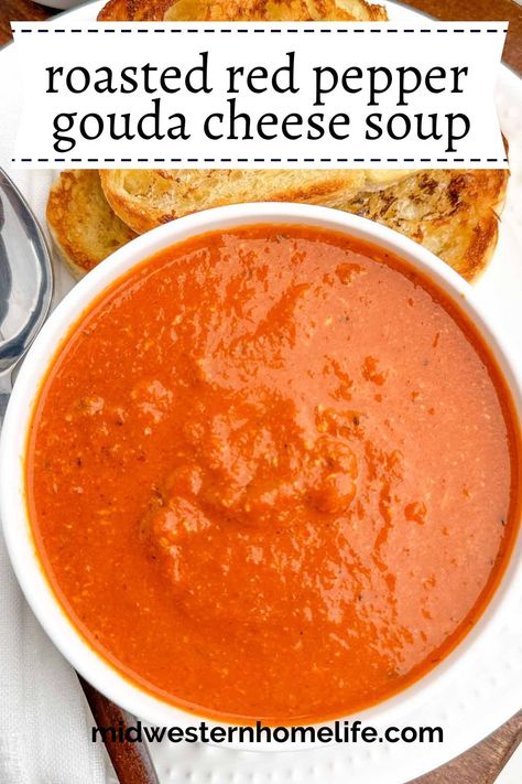 Cozy up with a bowl of Roasted Red Pepper and Gouda Soup! This easy, creamy soup is loaded with smoky gouda, roasted red peppers, and a blend of savory spices. Perfect for cold nights, meal prep, or freezing for a quick meal later Red Pepper Soup With Gouda, Tomato Gouda Soup, Oven Roasted Soup, Roasted Red Pepper Soup With Gouda, Roasted Red Pepper Gouda Soup, Roasted Red Pepper And Gouda Soup, Recipes With Gouda, Roasted Red Pepper And Tomato Soup, Red Pepper And Gouda Soup