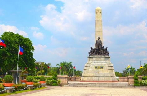 The BEST Places to Visit in Manila with Kids - Go Places With Kids Rizal Park Aesthetic, Jose Rizal Aesthetic, Jose Rizal Aesthetic Background, Rizal Park Manila, Aesthetic Background Landscape, Korean Soldier, Fort Santiago, Rizal Park, Park Aesthetic