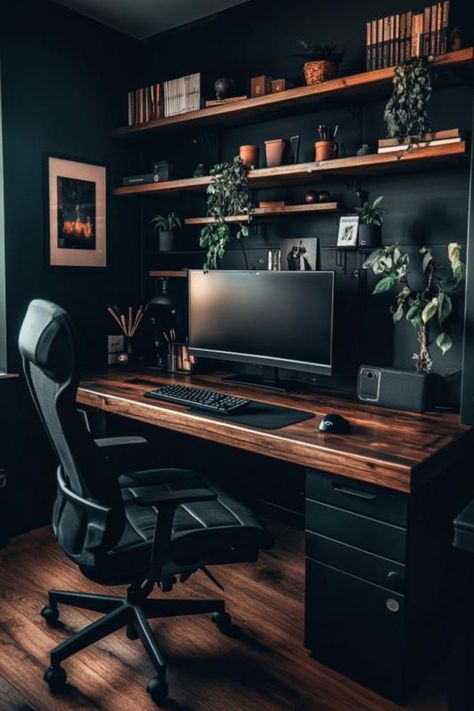 A Dark Moody Small Home Office featuring a sleek, minimalist desk setup with wooden shelves, plants, and warm lighting embodies the essence of Dark Scandinavian Minimalism, perfect for those seeking Moody Office Ideas for a Dark Modern Office or a Home Office Dark design. Desk With Accent Wall, Dark Minimalism Interior, Moody Academia Office, Modern Dark Room, Dark Office Interior Design, Black And Wood Desk, Office Design Ideas Workspaces, Black Office Ideas, Home Office Dark Wood