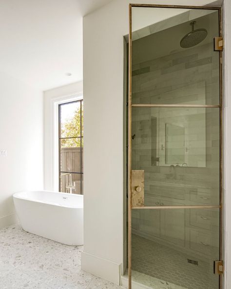 Heritage Blue Homes on Instagram: “Love how our brass shower door turned out, thank you to @oronametal! 🤍 📷 @costachristmedia 🙌 #newbuild #dallasnewhomes…” Unique Shower Doors Ideas, Single Door Shower Ideas, Gridded Shower Door, Brass Shower Doors, Reeded Shower Door, French Shower Doors, Glass Shower Door Ideas, Reeded Glass Shower Door, Brass Glass Shower Door