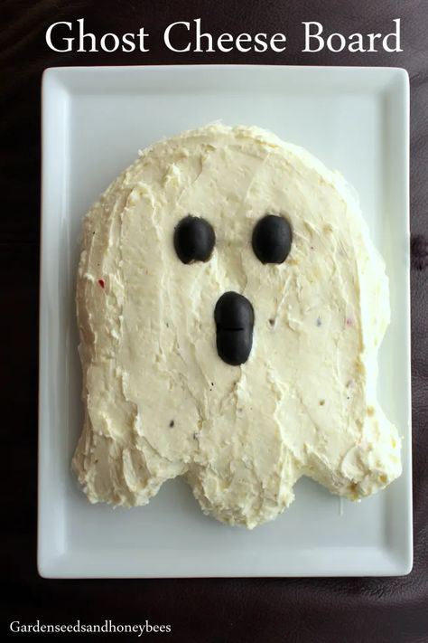 Ghost Cheese Board - Garden Seeds and Honey Bees Halloween Cheese And Cracker Platter, Ghost Cheese Ball, Ghost Meatballs, Ghost Charcuterie Board, Skull Cheeseball, Ghost Themed Food, Halloween Cheese Tray, Ghost Snacks, Ghost Desserts