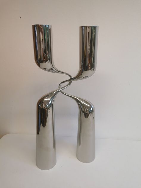 EXTREMELY rare set of floor candlesticks, in chrome plating, designed by Mikaela Dorfel for Menu Denmark. Set of two "Twisted" candlesticks, made of chrome plated steel. Design by Mikaela Dörfel for Menu, Denmark. They are inspired by a dancing couple and can be placed in several different ways, each giving the candlesticks a new look. You usually see them in normal/small size, but these are floor candle holders that measure a full 66 cm in height, 10 cm in diameter at the bottom, 7.5 cm in diam Chrome Candle Holders, Chrome Decor, Twist Candle, Dancing Couple, Floor Candle Holders, Floor Candle, Vintage Candlesticks, Ceramic Candle, Dream House Decor